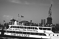 [Circle Line at Ellis Island (with Statue of Liberty and World Trade Center)]